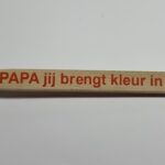 Kwast met tekst